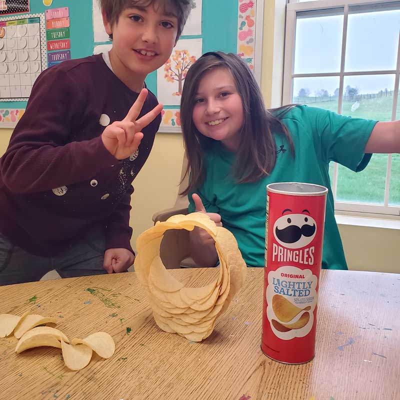 Two children conducting hands-on learning